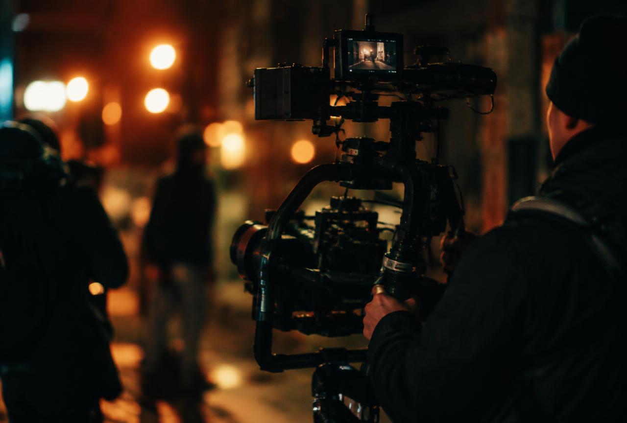 Cinema camera on a gimbal during a night shoot
